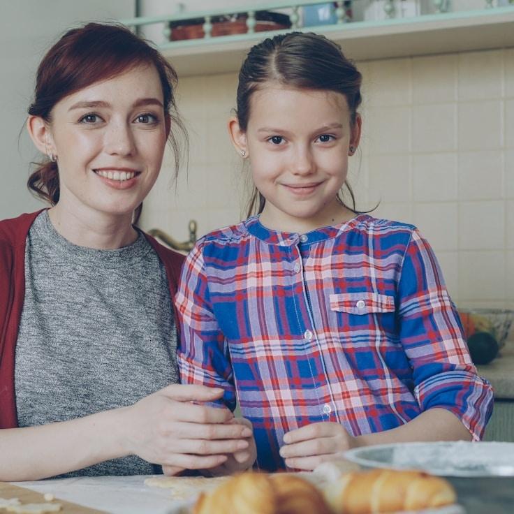 Alex Chen, Lead Design Curator at CrownAtlasAmber, reviewing corporate floral arrangements